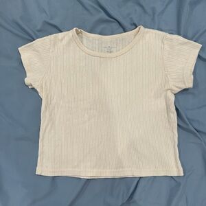 brandy melville | cream baby tee with engraved patterns